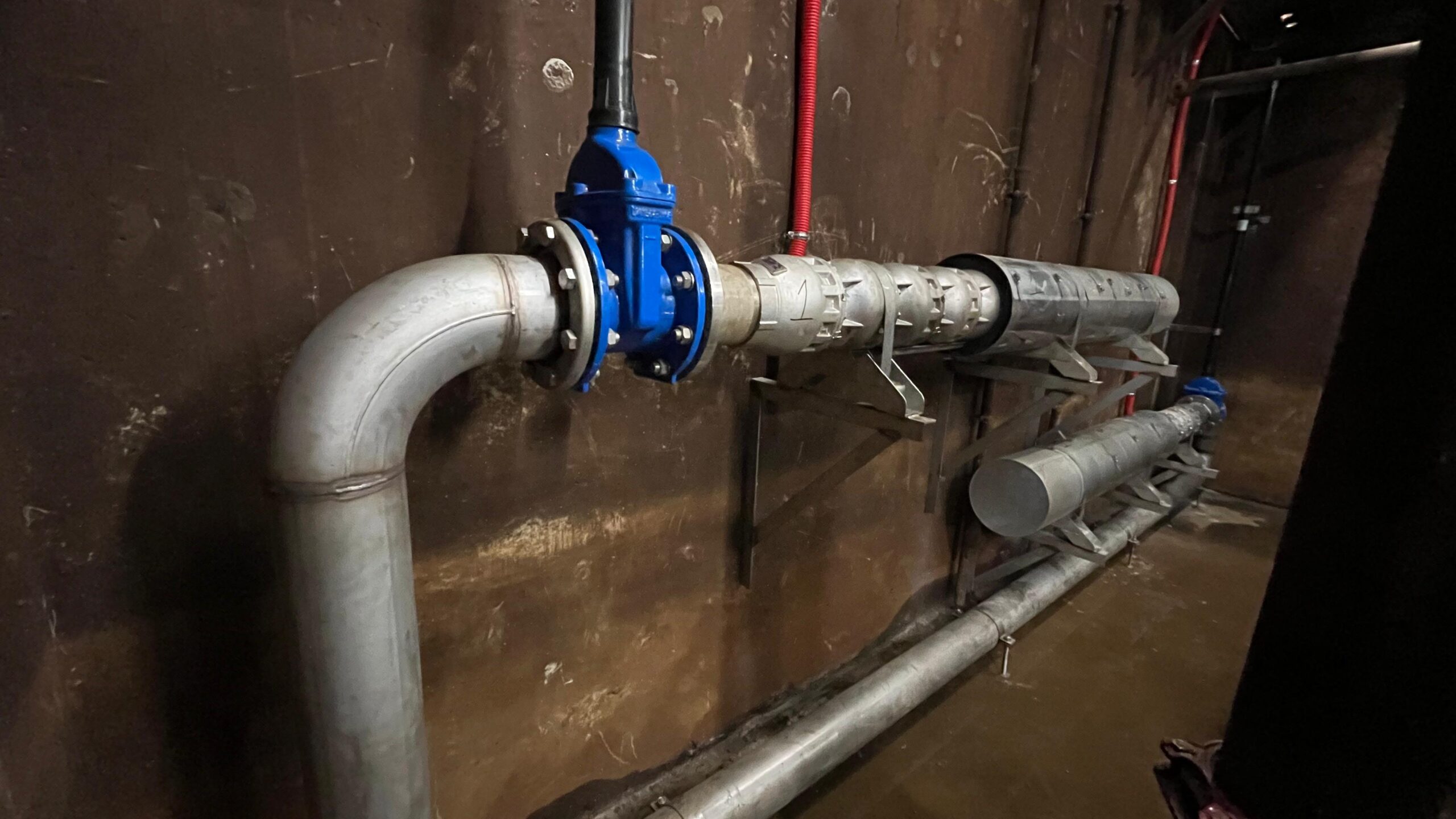 Delivery and installation of submersible water supply pumps and control panels with integrated variable frequency drives