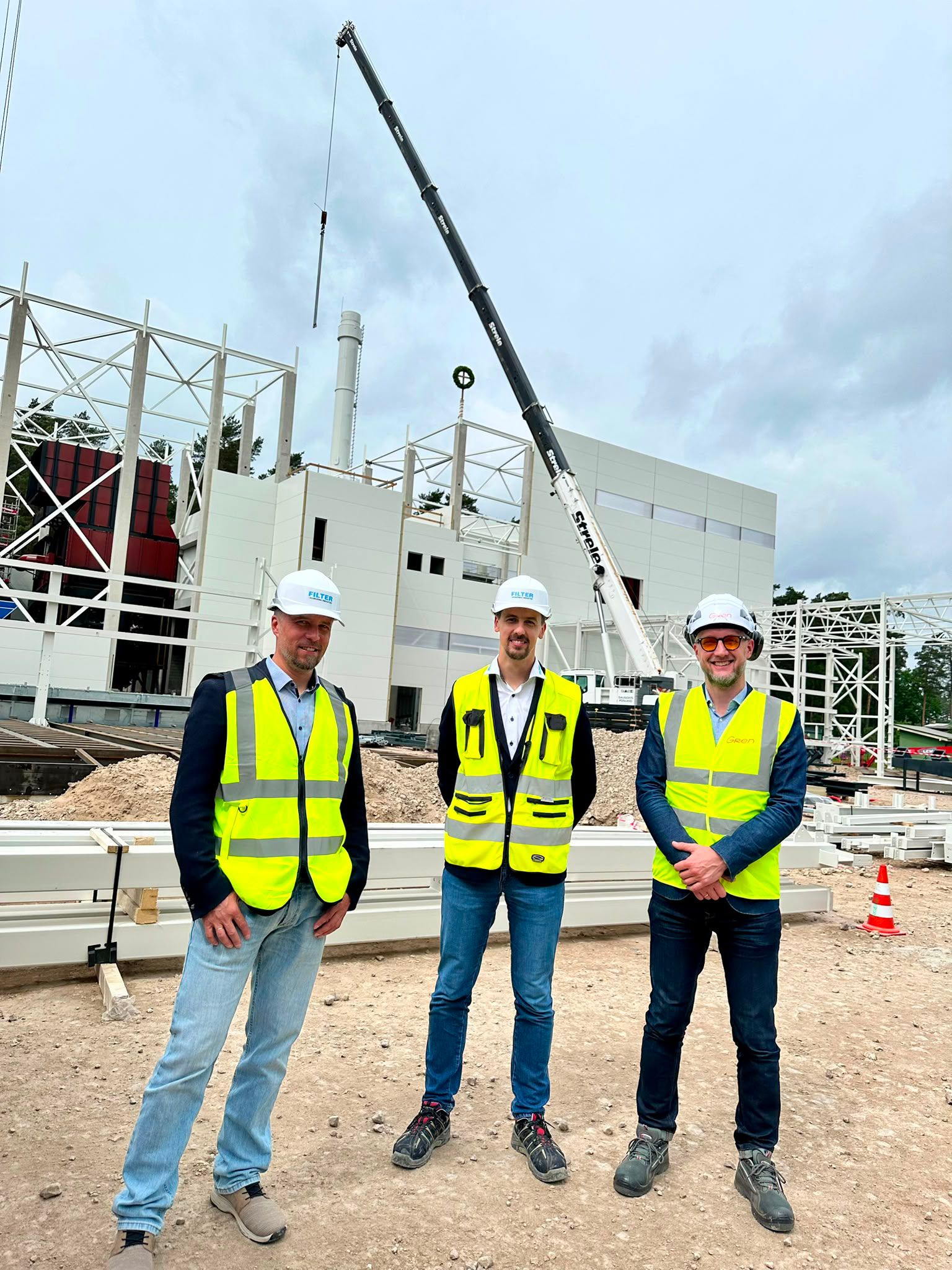 FILTER and Gren representatives at the topping-out ceremony of Gren's 50 MW biomass boiler house in Riga